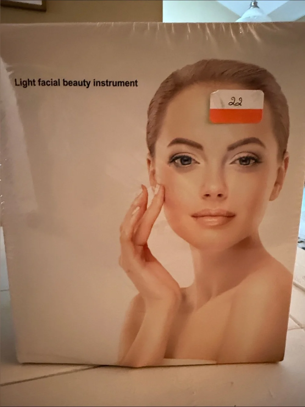 Light Facial Beauty Instrument - Cream/Peach Packaging